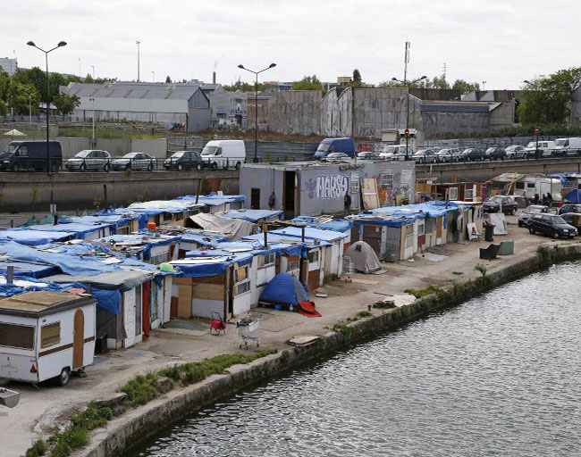 Illustration - Nouvel appel contre le mal-logement - Bidonville près de Paris, mai 2013 (Crédit: FRANCOIS GUILLOT / AFP)